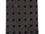 the tie is black and has squares of black on it