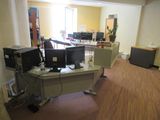 an image of a room with a lot of desks and computers