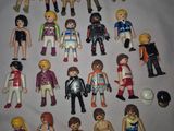 a lot of playmobils that are on a table