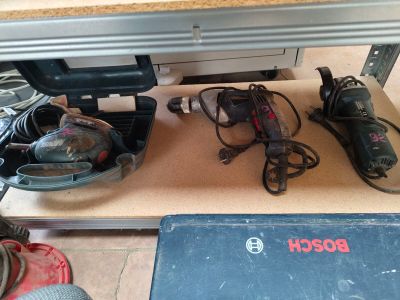 a table that has a bunch of tools on top of it