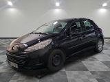 a picture of a black car parked in a garage