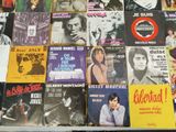 many different types of vinyl records on the table