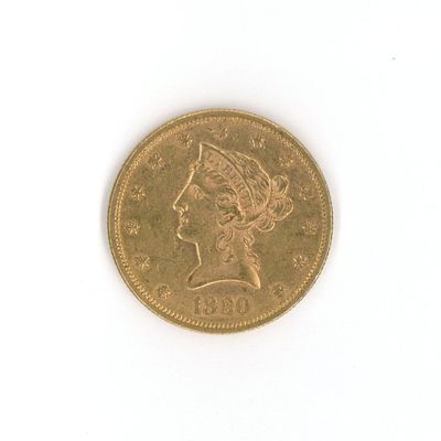 an image of a gold coin with a woman ' s head on it