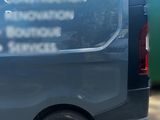 a van that is parked on the side of the road