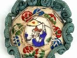 a decorative ornament with a picture of a cat on it