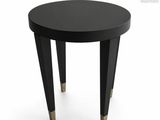 a black table with gold legs on a white background