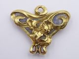 an image of a gold plated pendant with a little girl on it