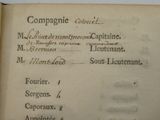 an old book that has some writing on it