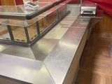 an image of a counter with a glass case on it