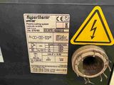 an image of a machine that has a warning sign on it