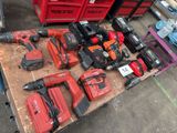 a lot of tools that are sitting on a table