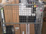 a large metal cage with a bunch of boxes on it