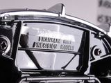 a close up of a black and white photo of a motorcycle