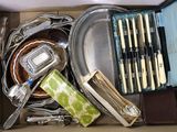 a box full of silverware and utensils in it