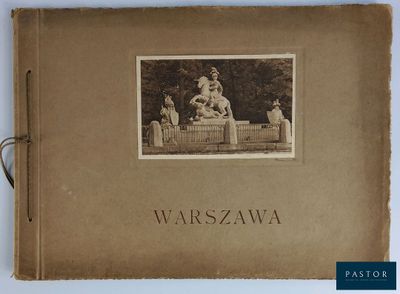 un vieux livre sur lequel figure l'image d'une femme assise sur un banc