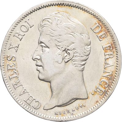 une vieille pièce d'argent avec un visage de femme dessus