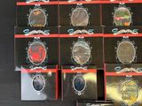 a lot of different types of coins in a box