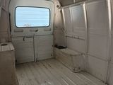 an image of a van with the door open