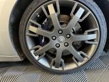 a close up of a tire on a car ' s rim