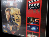 a box with a picture of a movie and a movie clapper