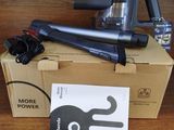 a box with a blow dryer and other items on top of it
