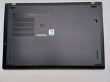 a black laptop with a blue sticker on the back of it
