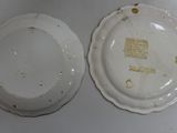 two plates that are sitting next to each other