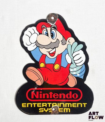 un autocollant « Nintendo Entertainment System » sur un mur blanc