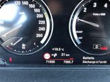 a close up of a car ' s dashboard with the speedometers on