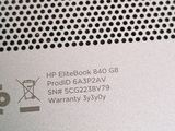 close up of the back of a laptop computer with a logo on it
