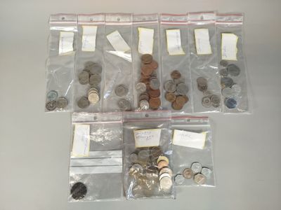 a lot of coins in the bags on the table