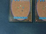 two decks of a card game that are on a table