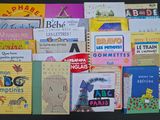 many children ' s books on the table together