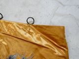 a yellow bag with a picture of a horse on it