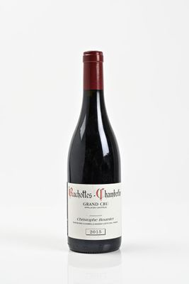 a bottle of wine that is sitting on a table
