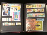 an open book with a lot of stamps on it