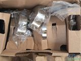 a cardboard box with a bunch of items inside of it