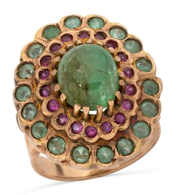 an image of a ring with a green stone surrounded by purple and green stones