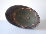 a helmet that is sitting on a table
