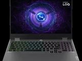 the laptop is open on a black background with a purple and blue design