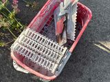 a red basket that has a bunch of fish in it