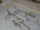 a lot of tools that are laying out on the floor