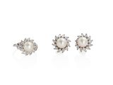 a pair of pearl and diamond earrings