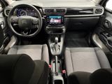 the interior of a car with a steering wheel and a dash board