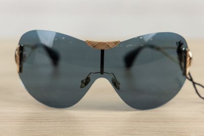 a pair of sunglasses that are on a table