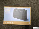 emballage d'une radio Philips surmontée d'une boîte
