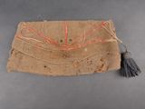 an old purse with a tassel hanging from it ' s side