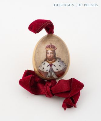 a picture of a miniature picture of a man wearing a crown