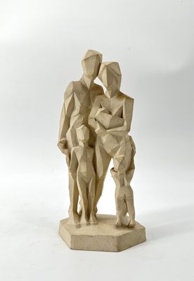 sculpture of a man and a woman with a child and a dog