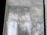 a close up of a piece of foil on top of a piece of paper